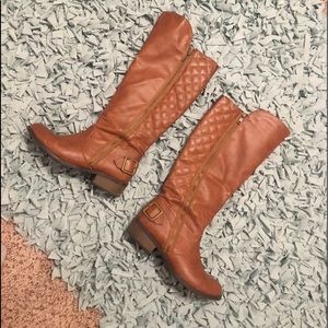 Brown riding boots